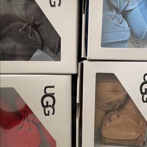 Baby Ugg boots, NEW 0/1 size,tan gray red & blue